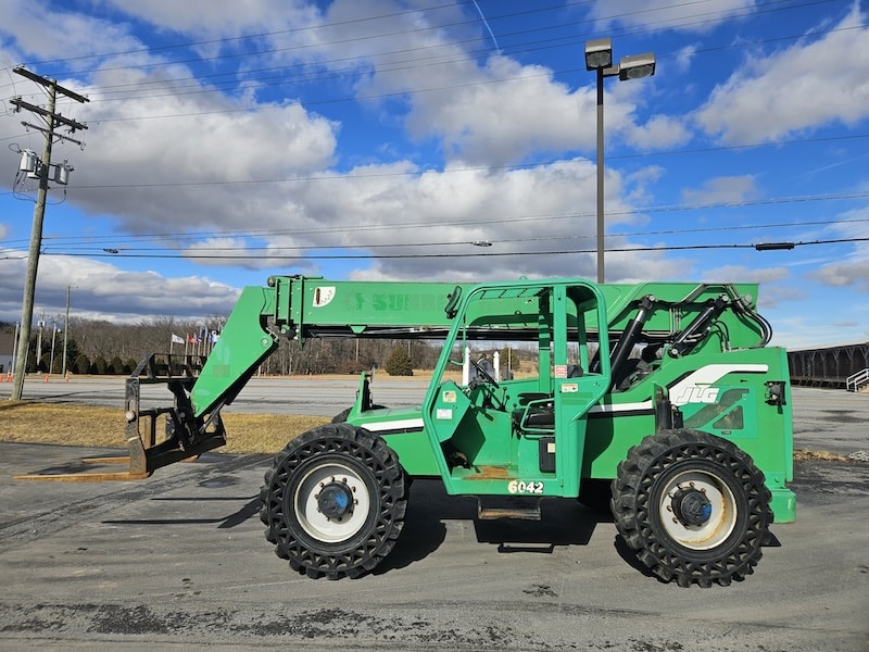 Green sitting in parking lot